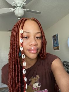 Braids With Shells Black Women, 350 Faux Locs Black Women, Cowrie Shells In Hair, 350 Locs Black Women, Cowrie Shell Hair Braids, Shell Braided Hair, Cowrie Shell Hairstyles, Ginger Crochet Locs, Faux Locs With Shells