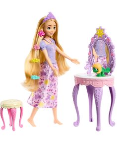 a barbie doll standing next to a table with a mirror and stool