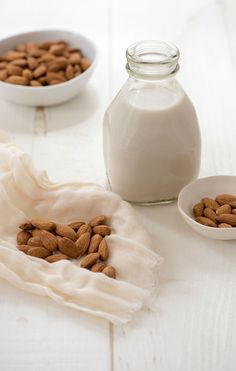 almonds and yogurt are on the table