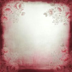 a red and white photo frame with flowers on it