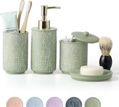 bathroom accessories including soap dispenser, toothbrush holder and brush in pastel colors