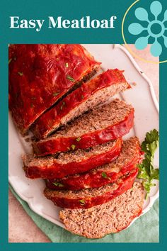 sliced meatloaf on a plate with parsley