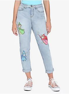 Always wanted a fairy godmother? Now you've got three! From  Sleeping Beauty , these light wash mom jeans fit just the way you like them and have patches of Flora, Fauna and Merryweather on front. 97% cotton; 1% spandex; 2% other fiber Wash cold; dry low Imported Listed in junior sizes Mommy And Me Frozen Shirts, Disney World Shirts Frozen, Mommy Daughter Shirts Disney, Arm Sleeve Disney, Disney Mom Sweaters, Disney Cute Clothes, Disney Princess Modern Clothes, Womens Disney Clothes, Dresses To Wear To Disneyland