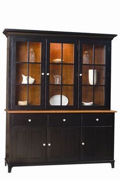 a black china cabinet with glass doors