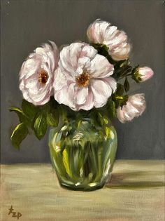 an oil painting of pink flowers in a green glass vase on a brown tablecloth