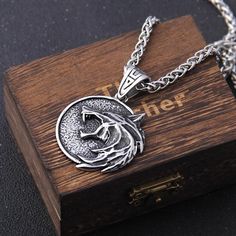 Geralt of Rivia's Necklaces - For Gamers and Fantasy Lovers A bold, durable Necklaces crafted from stainless steel, perfect for men or woman who love Norse Mythology. Ideal for those seeking a Nordic-inspired gift. ✅Material Made from stainless steel, ensuring durability, and a sleek finish. ✅Length 50 cm 70 cm ✅HOW TO ORDER YOUR Wolf Stainless Steel Pendant 1. Check our photos for sizing options. 📏 2. Choose the quantity of Necklaces you'd like to order. ✨ 3. Select your size from the drop-dow Witcher Medallion, Viking Arm Rings, The Wild Hunt, Witch Pendant, Vikings Gifts, Mens Chain Bracelet, Wolf Necklace, Viking Necklace, Doll Jewelry