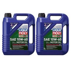 two bottles of motor oil sitting next to each other on a white background, one is blue and the other is green