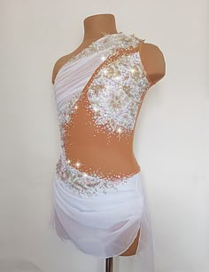 a white dress with sequins on it