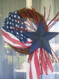 a wreath with an american flag on it