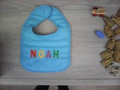 Hello cave if offer This pretty bib boy It is personalized to Noah's first name In sponge and embroidery It measures 27 cm tall Nine Birth gift or other Shipping costs are offered from the second item purchased Thank you for visiting First Name, Baby Bibs, Childcare, Personalized Baby, First Names, Marketing And Advertising