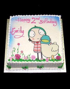 a birthday cake with a cartoon character holding a chicken on it's face and the words happy 2nd birthday