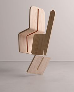 a wooden chair sitting on top of a white floor