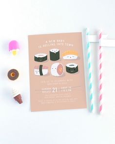 sushi themed birthday party with popsicles and paper straws on the table