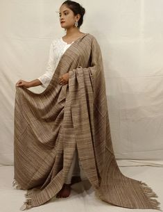 Here is a large collections of shawl. This shawl is quite large and has many different uses, you can use it as: Blanket, Scarf, Shawl, Meditation Blanket, Head Scarf, Sofa Blanket, Picnic Blanket - the possibilities are endless! Material: 100% Pure wool, Organic wool Handmade Delivery from a small business in India Care: Wool garments should be washed on the wool setting (usually gentle action at 40oC). If your washing machine does not have a wool cycle, use the cold water wash or wash cycle for Meditation Blanket, Handwoven Shawls, Winter Shawl, Sofa Blanket, Head Scarf, Shawls And Wraps, Picnic Blanket, Shawl, Meditation