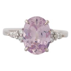 Celebrate your love story with our enchanting GIA Certified Oval Pink Sapphire Engagement Ring, adorned with Cluster Diamonds. The centerpiece is a breathtaking 3.29 carat purple-pink sapphire, all-natural and unheated, measuring 11.08x7.98x4.62mm. Nestled between 8 diamonds—6 round and 2 marquise cut, totaling approximately 0.20 carats—this ring exudes sophistication. Set on a 14K white gold band, it radiates enduring allure. Ready to ship in size 6, with complimentary resizing and custom engra Pink Sapphire Engagement Ring, Sapphire Diamond Engagement Ring, Pink Sapphire Ring Engagement, Diamond Sapphire Engagement Ring, Sapphire Diamond Engagement, Sapphire Engagement Ring, White Gold Band, Sapphire Engagement, Marquise Cut