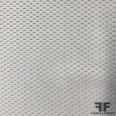 an image of a white textured paper with circles