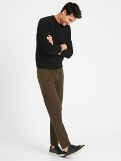 BRUSHED TRAVELER: A cozy update to our best-selling Traveler pant, this version is made Italian stretch cotton moleskin, so it has a flannel-like finish.  ATHLETIC TAPERED FIT: Not just for athletes, this fit is designed to deliver a modern, slim fit for those who like a little more room through the seat and thigh.  Zip fly with button closure.  Belt loops.  Five-pocket styling.  Tapered Fit: Mid-rise.  Extra room through the seat and thighs.  Tapered leg.  Slim leg opening measures 6. 75" flat. Skater Business Casual Men, Straight Leg Pants Outfit Winter, Men Teacher Outfits High School, Redbull Outfits, Mens Work Fashion, Mens 40s Fashion, Dark Outfits Men, Mens Athleisure Outfits, Men's Urban Style