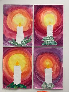 four paintings with white candles on them