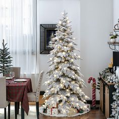 a white christmas tree in a living room