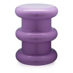 a purple plastic stool sitting on top of a white floor