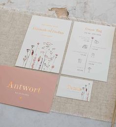 the wedding stationery is laid out and ready to be put into their guests'names