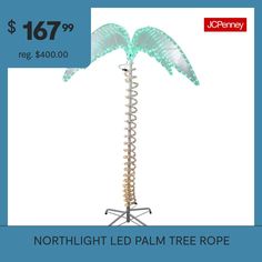 the light up palm tree is on display for $ 69 99 reg $ 800 00