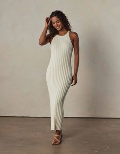 Normal Brand Spring 2024! Crafted from 100% cotton in a wide rib pattern for a flattering form-fitting silhouette in a classic cotton feel. The fine sweater knit is breathable and and adds texture to the mid-weight fabric. With its all-over rib knit, high neck, and side slit, this dress combines timeless elegance with a modern edge. S2VLZAHD Eliza Dress, Henley Sweater, Scarf Top, Ribbed Knit Sweater, Overall Dress, Fall Shopping, Sweater Knit, Ribbed Sweater, Xl Dress