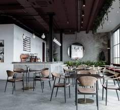 an empty restaurant with tables and chairs