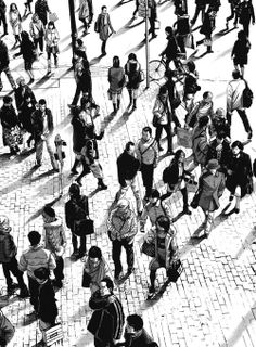 a crowd of people walking down a street next to each other in black and white