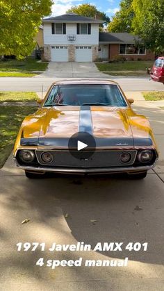 an old car parked in front of a house with the words 1971 javelin amx 4074 4 speed manual