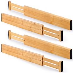 three pieces of wood with black handles on each side