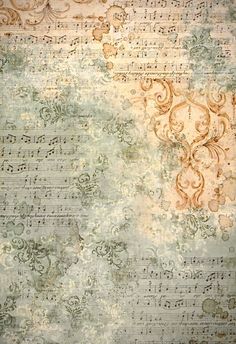 an old sheet of music with musical notes on the side and faded paint all over it