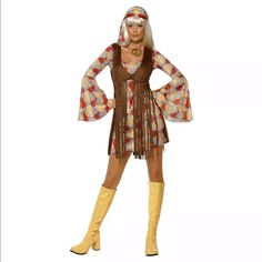 a woman in a costume is standing with her hands on her hips and wearing yellow boots