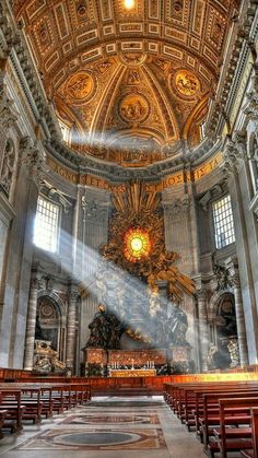 the inside of an old church with pews