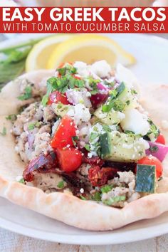 an easy greek taco with tomato cucumber salsa