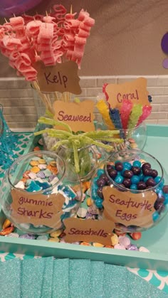 a table topped with lots of candy and candies