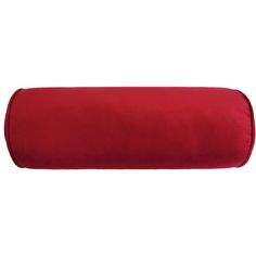 a red pillow on a white background with the bottom half rolled up to show it's side