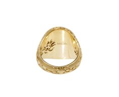 Inspired by history, myths and biology, this Castro Smith signet ring has been carefully hand engraved. The oval 9K yellow gold ring face has been carved with a prancing hare under a crescent moon above tiny mushrooms and leaves. The rest of the composition shows a snapping metal trap and more leaves and mushrooms. Perfect no matter which finger you wear it on. ring face : 3/4" x 5/8"9K yellow gold band width : 5mmsize available : 7please contact us for sizing options Heirloom Carved Engraved Ring For Collectors, Ceremonial Oval Signet Ring With Intaglio, Ceremonial Oval Intaglio Ring, Heirloom Oval Signet Ring For Ceremonial Occasions, Ceremonial 14k Gold Engraved Intaglio Ring, Ceremonial Engraved Open Ring With Hallmark, Ceremonial Oval Signet Ring Stamped 14k, Luxury Carved Yellow Gold Signet Ring, Ceremonial Hallmarked Engraved Open Ring