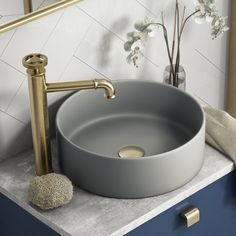 a bathroom sink sitting on top of a counter