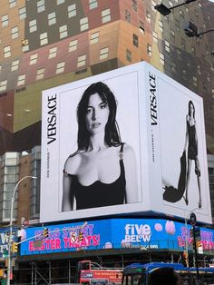 a large billboard on the side of a building in new york's times square