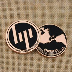 two lapel badges with the word, anti - conference america and an image of the world