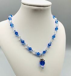 "Sapphire Blue is September Birthstone.  Swarovski Crystal with Sterling Silver clasp. 17\" as shown. Unique gift for Sept. birthday girls. Available in different lengths. Message us. Birthstones: Jan. = Garnet Feb.= Amethyst  March= Aquamarine April= Diamond/Crystal  May= Emerald  June= Pearl/light amethyst/alexandrite July= Ruby Aug.=Peridot  Sept.= Sapphire  Oct. Rose Pink/Opal Nov. = Citrine, Yellow Topaz Dec. Zircon/Turquoise  I have always loved Jewelry.  When I was a little girl I would l Blue Adjustable Jewelry With Sparkling Stones, Adjustable Blue Jewelry With Sparkling Stones, Blue Crystal Jewelry With Faceted Beads, Blue Crystal Necklace With Faceted Beads, Blue Crystal Necklaces With Faceted Beads, Blue Crystal Necklace As Gift, Blue Crystal Necklace Gift, Blue Crystal Necklaces For Gifts, Blue Crystal Necklaces As A Gift