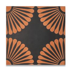 an orange and black design with fan like shapes on the back of a square tile