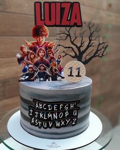 a birthday cake with an image of the characters on it