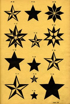 an old book with black and yellow stars on it's pages, all in different sizes