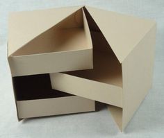 two open boxes sitting on top of each other