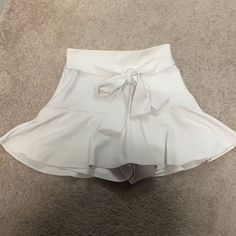 Never Worn! Zara Cream Skirt With Built In Shorts (Skort) With Front Tie, Size Small! Super Cute And Flattering White Summer Bottoms For Party, Elegant Zara Shorts For Spring, Solid Skirt For Brunch, Elegant Stretch Shorts For Spring, Stretch Mini Bottoms For Brunch, Chic Mini Length Shorts For Brunch, High Waist Skort For Brunch, Stretch Mini Length Bottoms For Brunch, Stretch Bottoms For Brunch