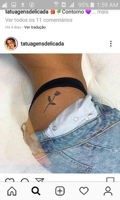 a person with a tattoo on their stomach