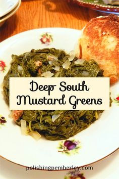 deep south mustard greens on a white plate with toasted bread in the background and text overlay that reads deep south mustard greens