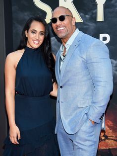 the rock and his wife are posing together on the red carpet at the sky film premiere